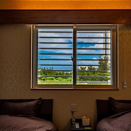 Kugani-Ya. Hotel Kin Luaran gambar