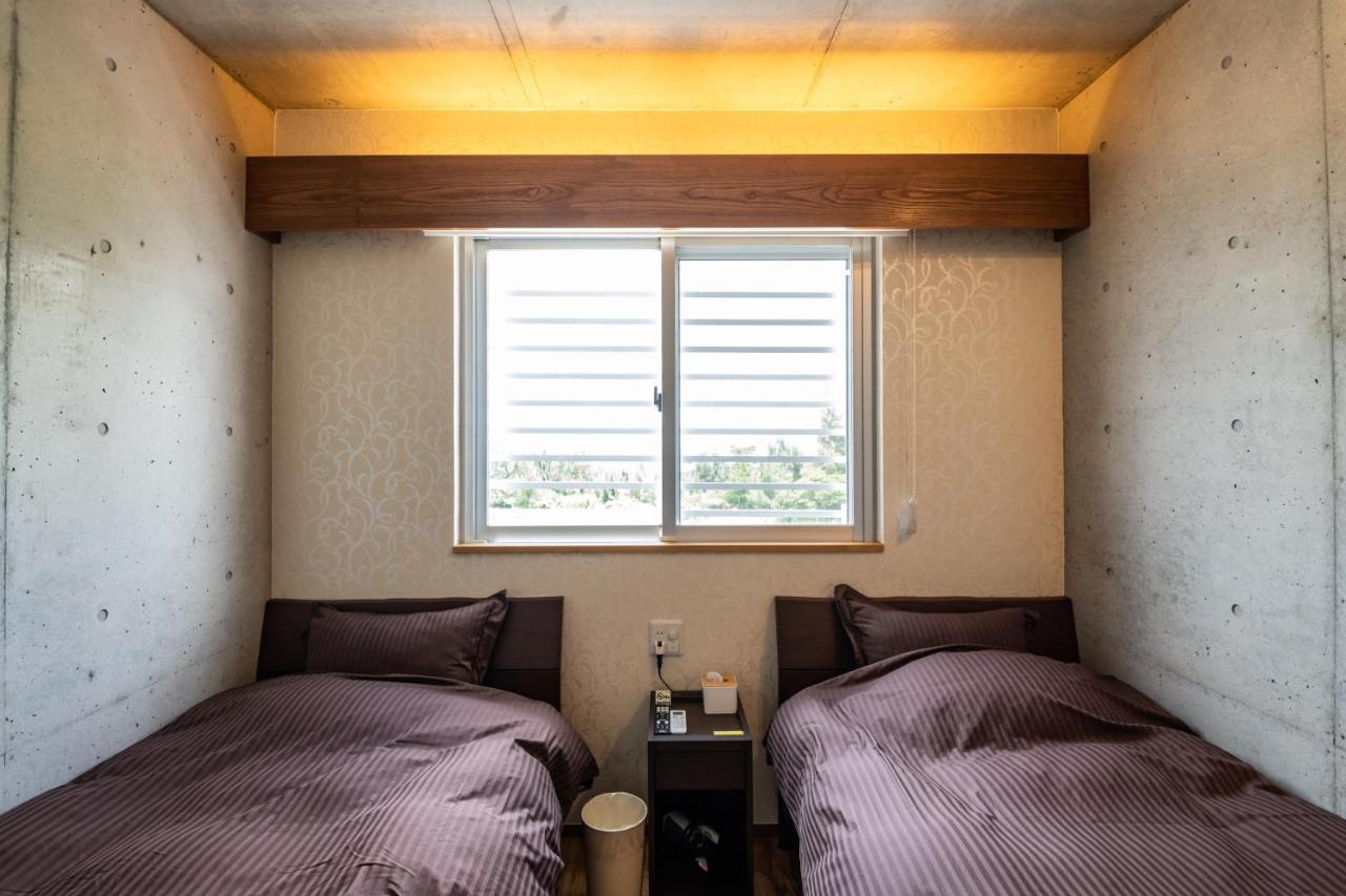 Kugani-Ya. Hotel Kin Luaran gambar